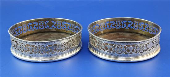 A pair of George III pierced silver wine coasters by Richard Morton & Co, 5in.